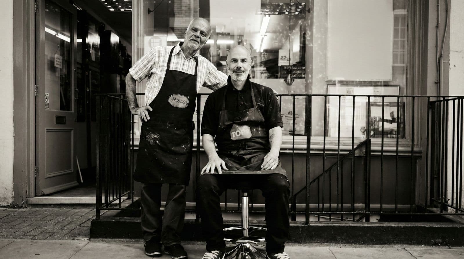 George and his father outside the workshop